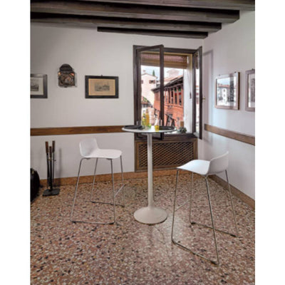 Mesa periquera redonda Colos Stato A/T-600 con base de acero y pedestal tubular alto