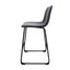 Banco bajo Kingstrong Phoenix con base metálica mate y asiento y respaldo tapizados de color