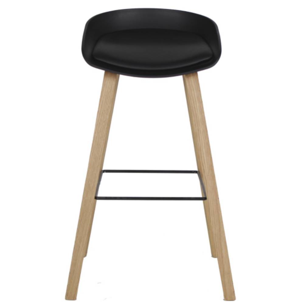 Banco alto Stella con asiento acojinado en vinipiel, patas de madera de haya y reposapiés metálico.
